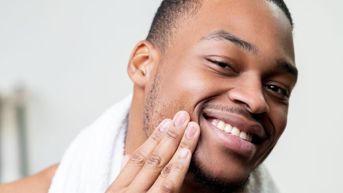 Black male with beard.